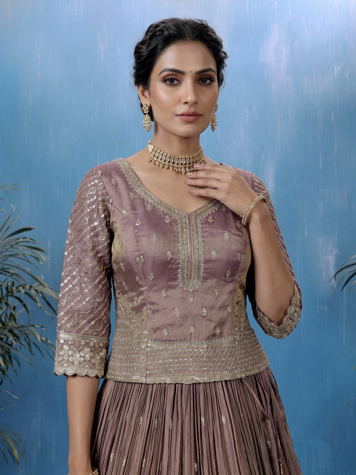 Pastel purple silk lehenga choli with intricate zardosi work