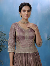 Pastel purple silk lehenga choli with intricate zardosi work