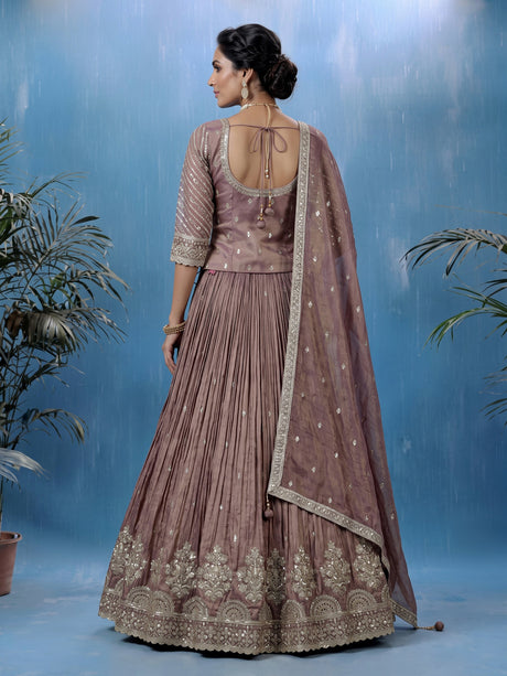 Pastel purple silk lehenga choli with intricate zardosi work