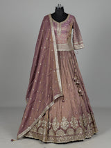 Pastel purple silk lehenga choli with intricate zardosi work