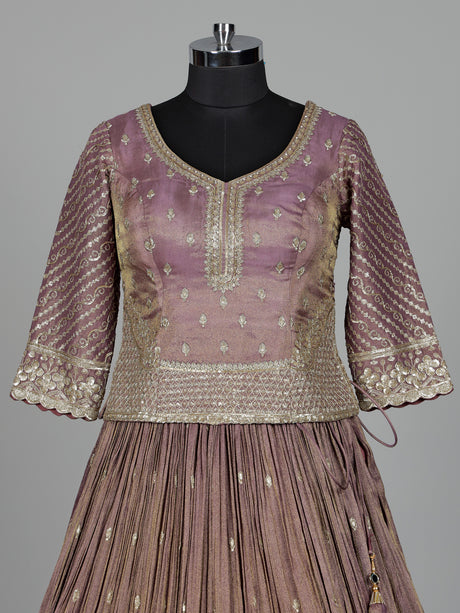 Pastel purple silk lehenga choli with intricate zardosi work