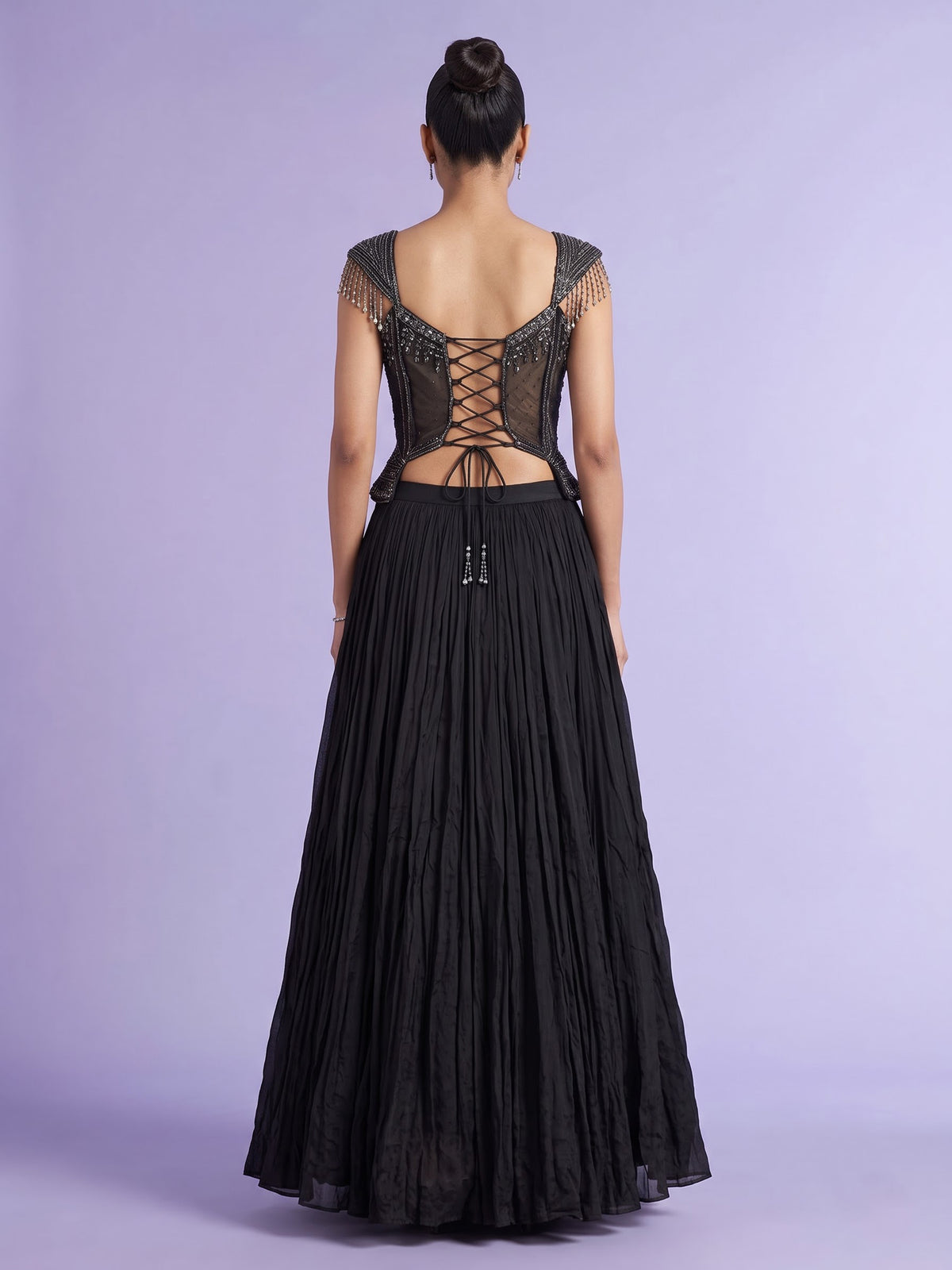 Black chiffon silk lehenga choli with diamond and cutdana embellishments