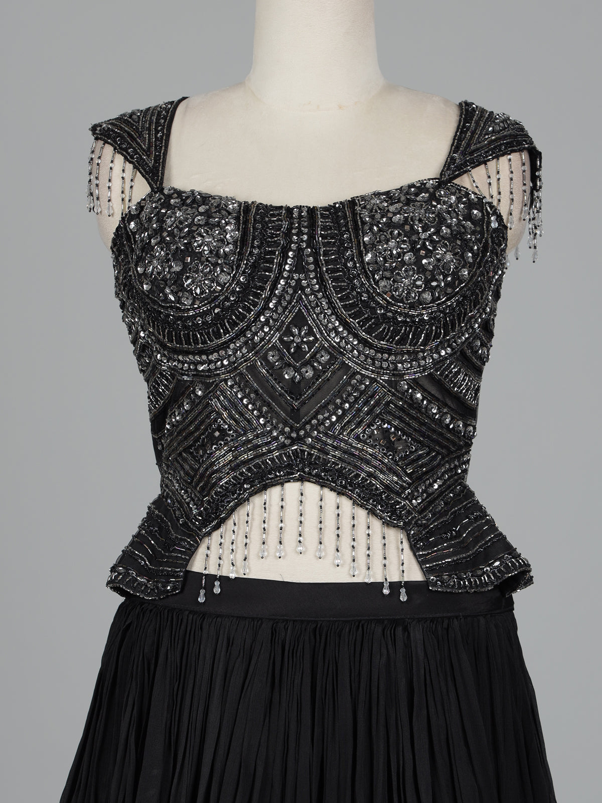Black chiffon silk lehenga choli with diamond and cutdana embellishments