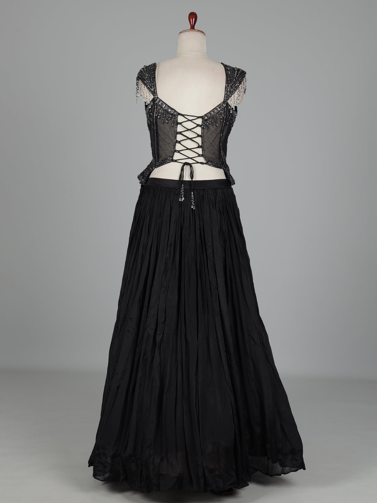 Black chiffon silk lehenga choli with diamond and cutdana embellishments