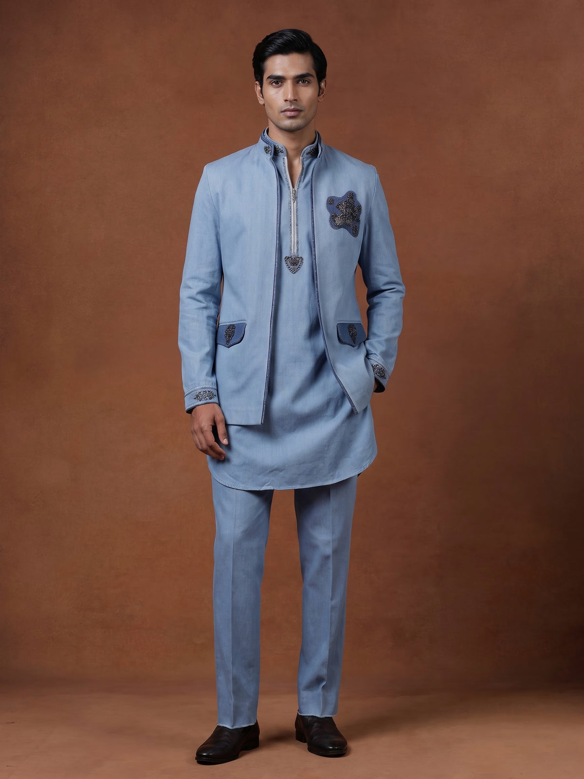 Sky blue waistcoat set with embellished brooch