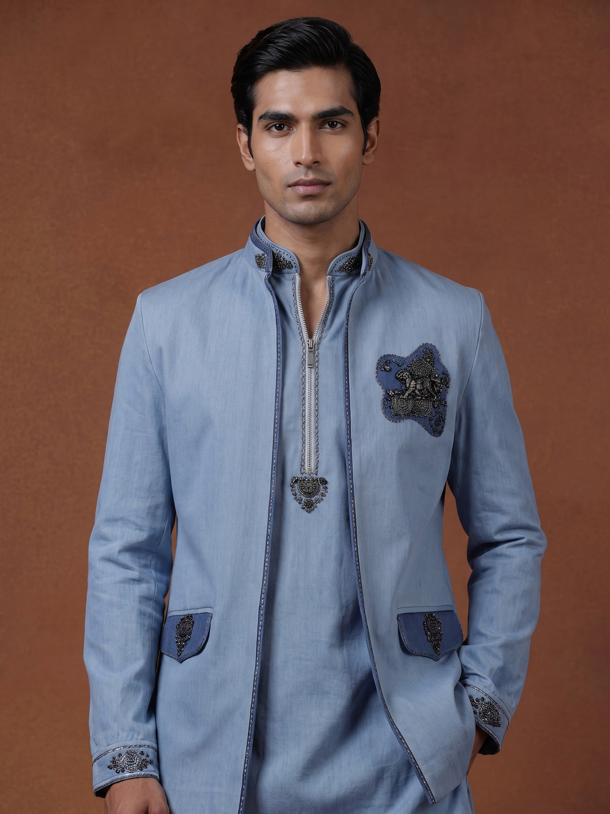 Sky blue waistcoat set with embellished brooch