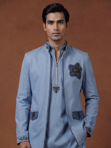 Sky blue waistcoat set with embellished brooch