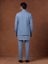 Sky blue waistcoat set with embellished brooch