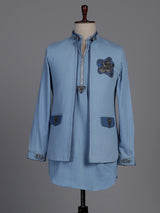 Sky blue waistcoat set with embellished brooch