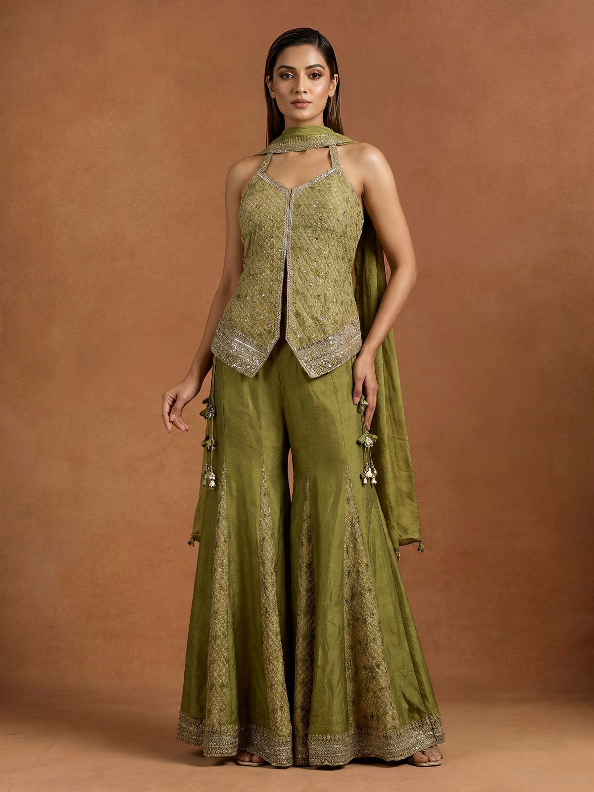 Regal mehendi green silk palazzo suit with zardosi detailing
