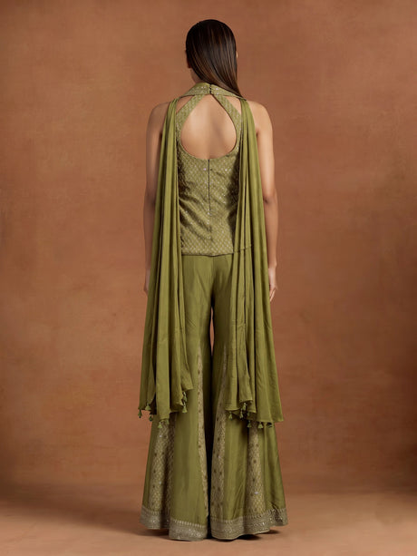 Regal mehendi green silk palazzo suit with zardosi detailing