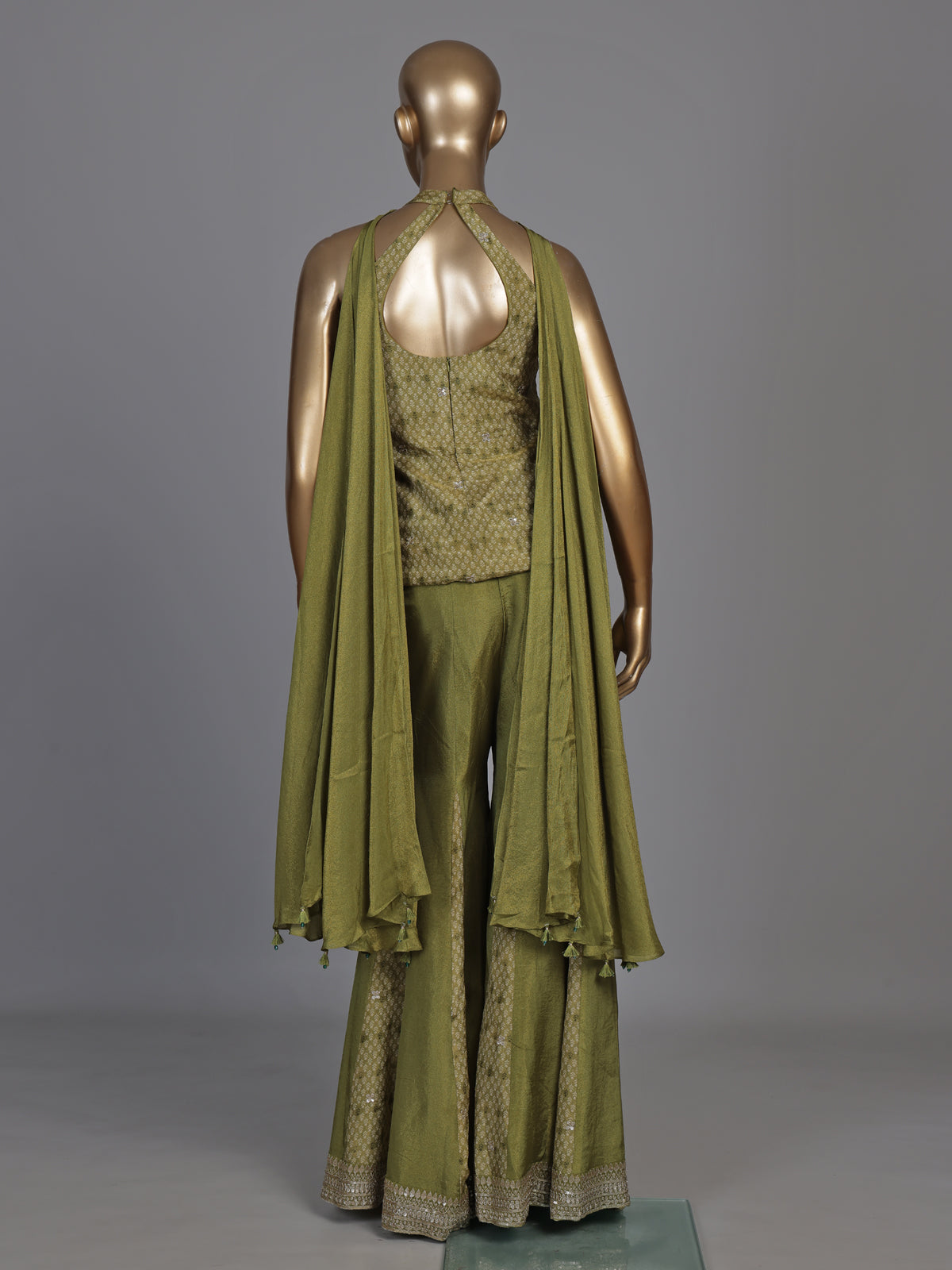 Regal mehendi green silk palazzo suit with zardosi detailing
