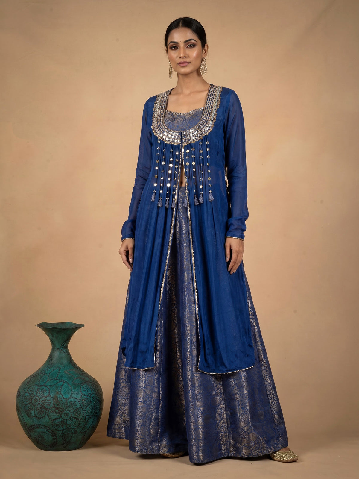 Elegant blue designer palazzo suit with intricate mirror and zardosi work