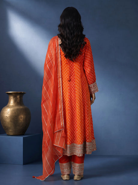 Rust orange modal silk anarkali suit with embroidered neckline