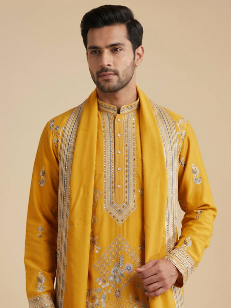 Mustard yellow georgette kurta suit with swan motif embellishments