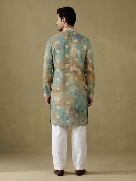 Sea green silk kurta suit with mirror work embroidered neckline