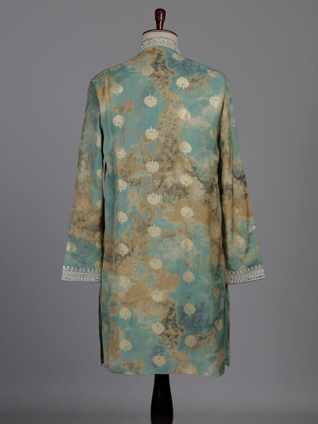Sea green silk kurta suit with mirror work embroidered neckline