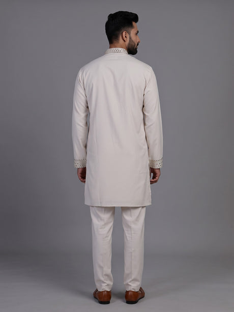 Off white short kurta suit with gold embroidered bib