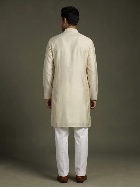 Cream cotton silk kurta suit with thread embellishments