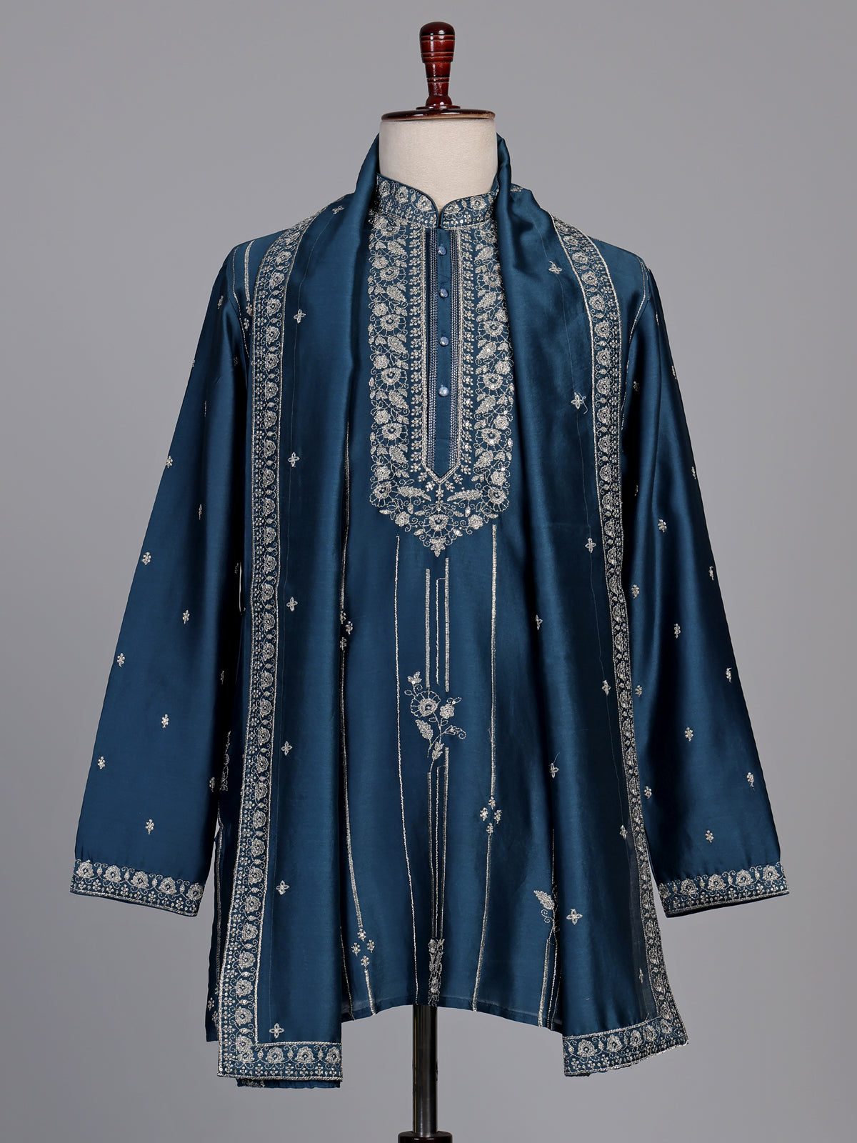 Deep teal silk kurta suit with golden embroidered neckline