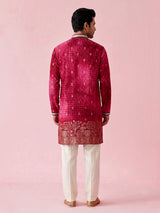 Rani pink bandhani silk kurta suit with mirror work detailing