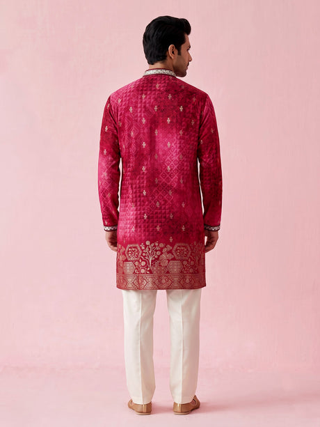 Rani pink bandhani silk kurta suit with mirror work detailing
