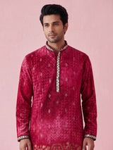 Rani pink bandhani silk kurta suit with mirror work detailing