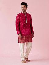 Rani pink bandhani silk kurta suit with mirror work detailing