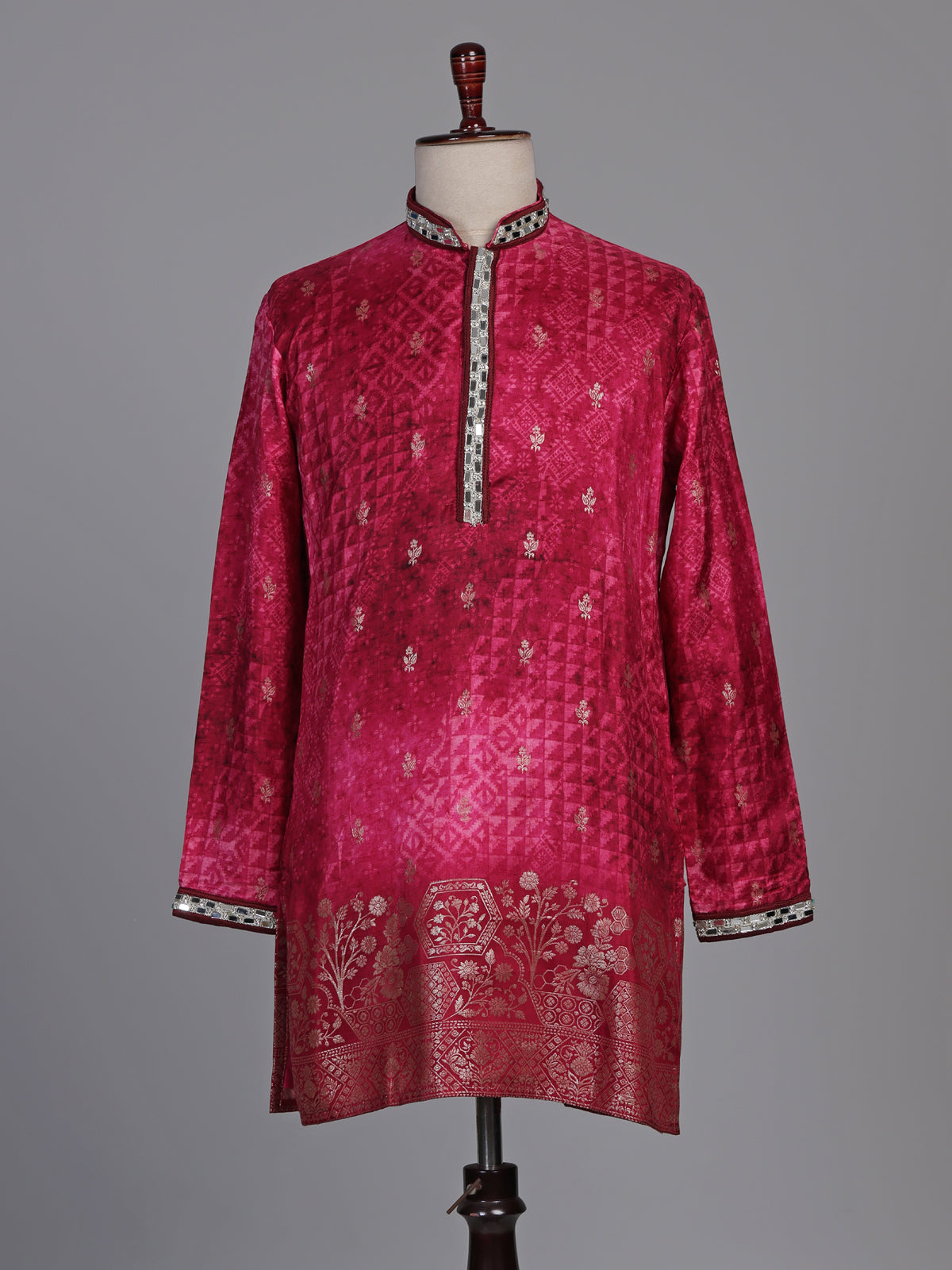 Rani pink bandhani silk kurta suit with mirror work detailing