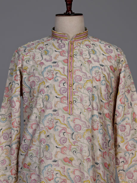 Off white embroidered kurta suit with pastel floral print