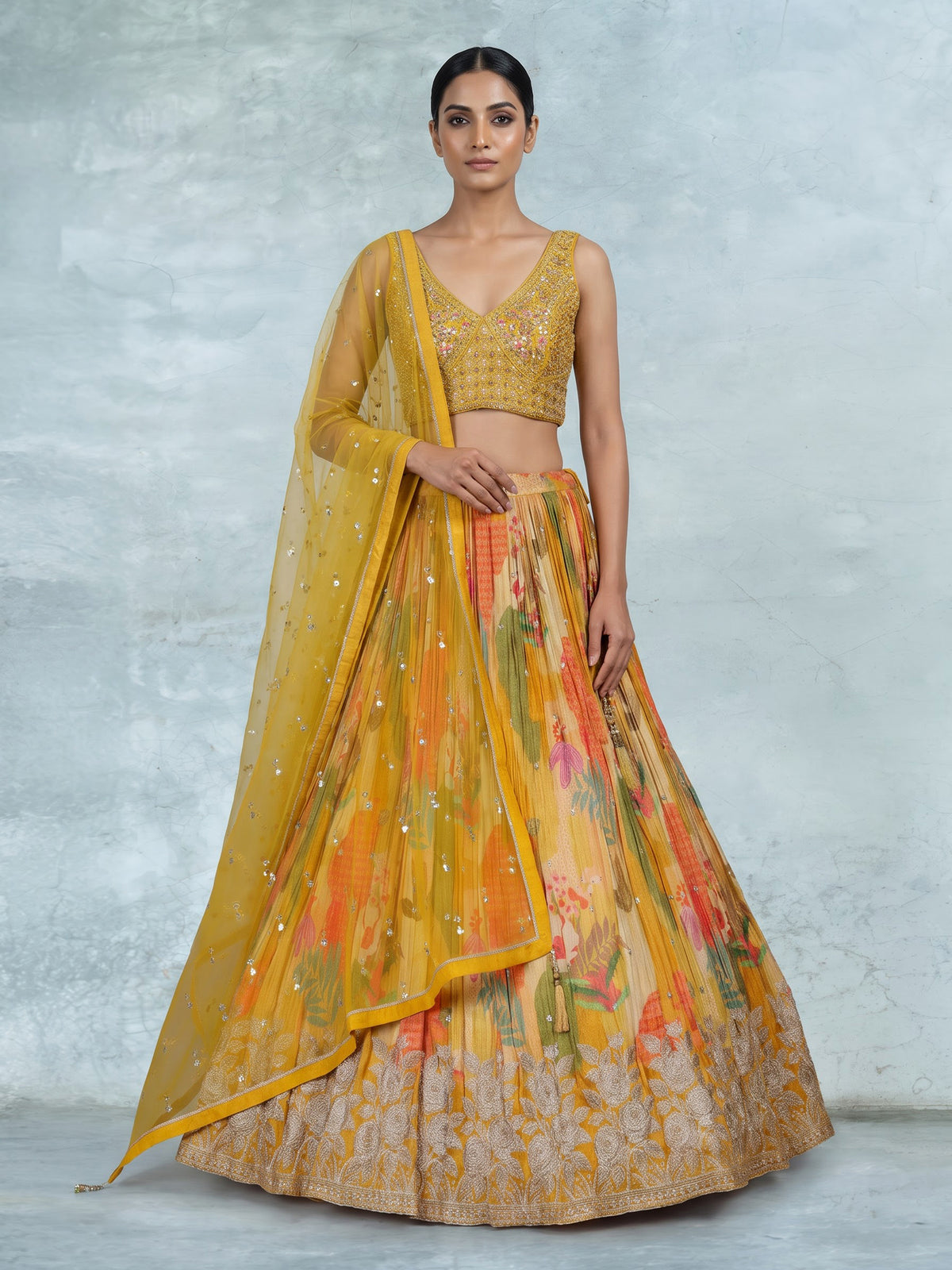 Mustard yellow floral silk lehenga choli with designer embellishments