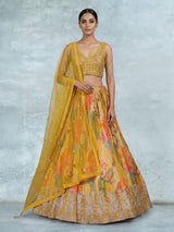 Mustard yellow floral silk lehenga choli with designer embellishments
