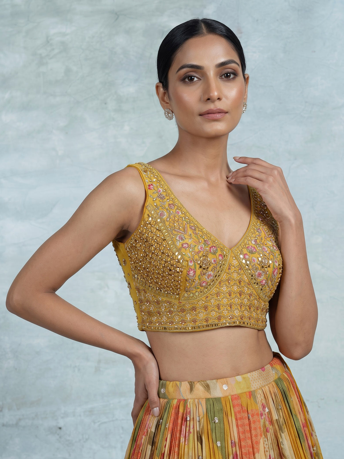 Mustard yellow floral silk lehenga choli with designer embellishments