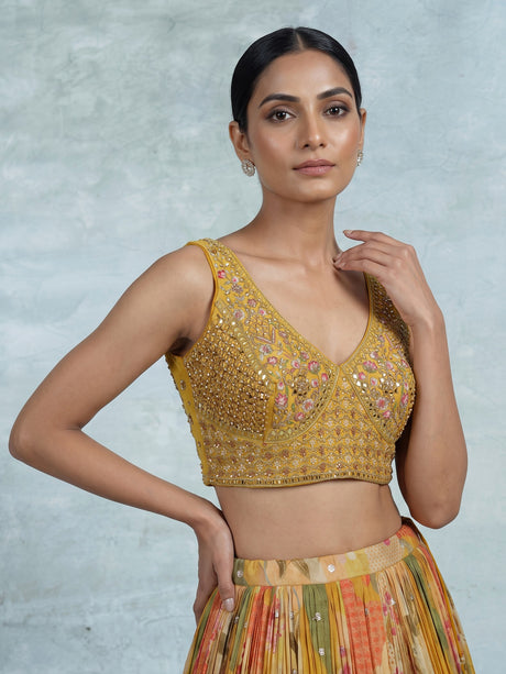 Mustard yellow floral silk lehenga choli with designer embellishments