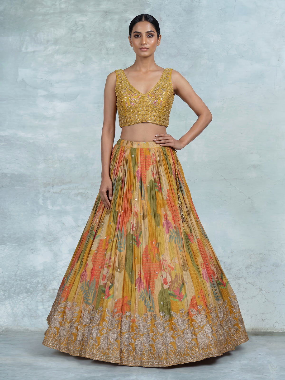 Mustard yellow floral silk lehenga choli with designer embellishments