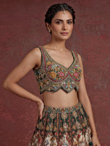Green silk peacock motif lehenga choli with zardosi detailing