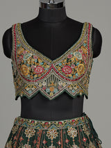 Green silk peacock motif lehenga choli with zardosi detailing