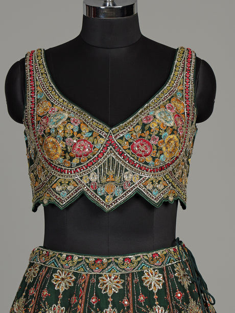 Green silk peacock motif lehenga choli with zardosi detailing