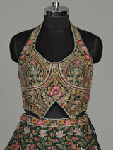 Green silk floral lehenga choli with halter neck embellishments