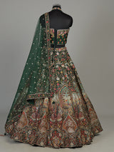 Green silk floral lehenga choli with halter neck embellishments
