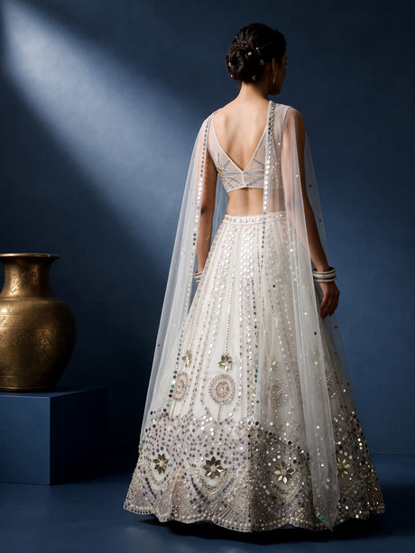White net designer lehenga choli with sparkling diamond embellishments