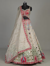 Beige raw silk peacock motif lehenga choli with mirror embellishments