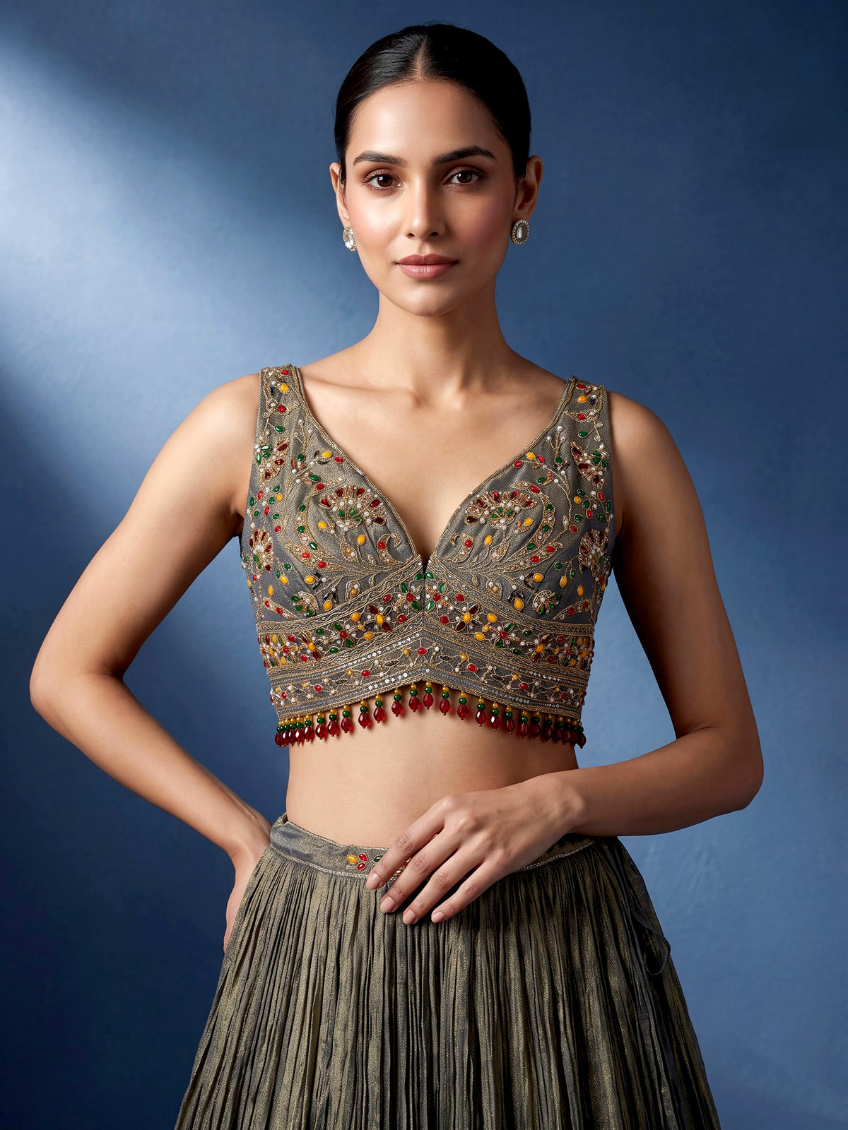 Pastel mehendi green silk lehenga choli with pearl embellishments