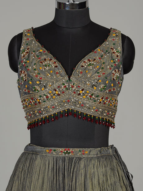 Pastel mehendi green silk lehenga choli with pearl embellishments