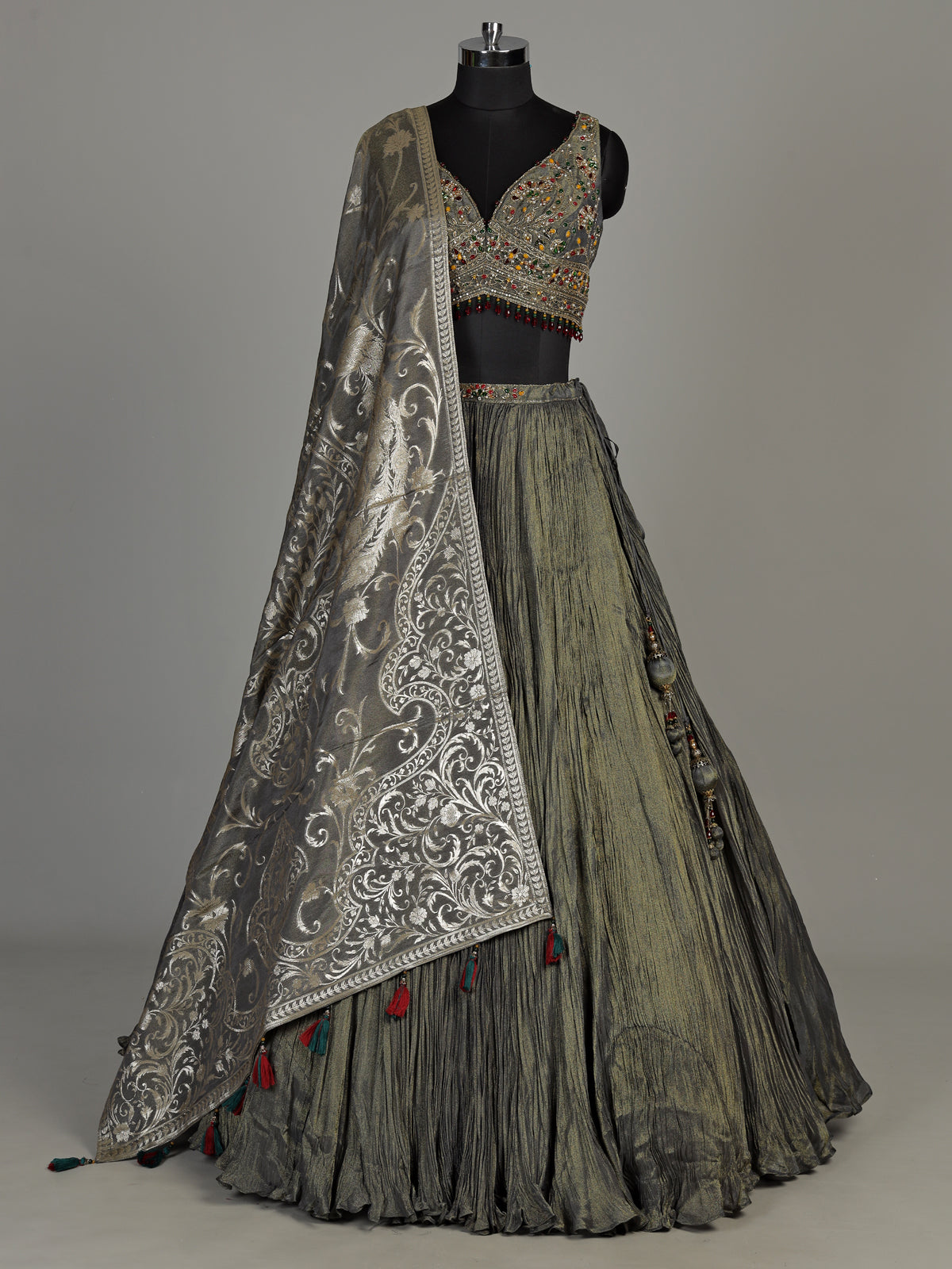 Pastel mehendi green silk lehenga choli with pearl embellishments
