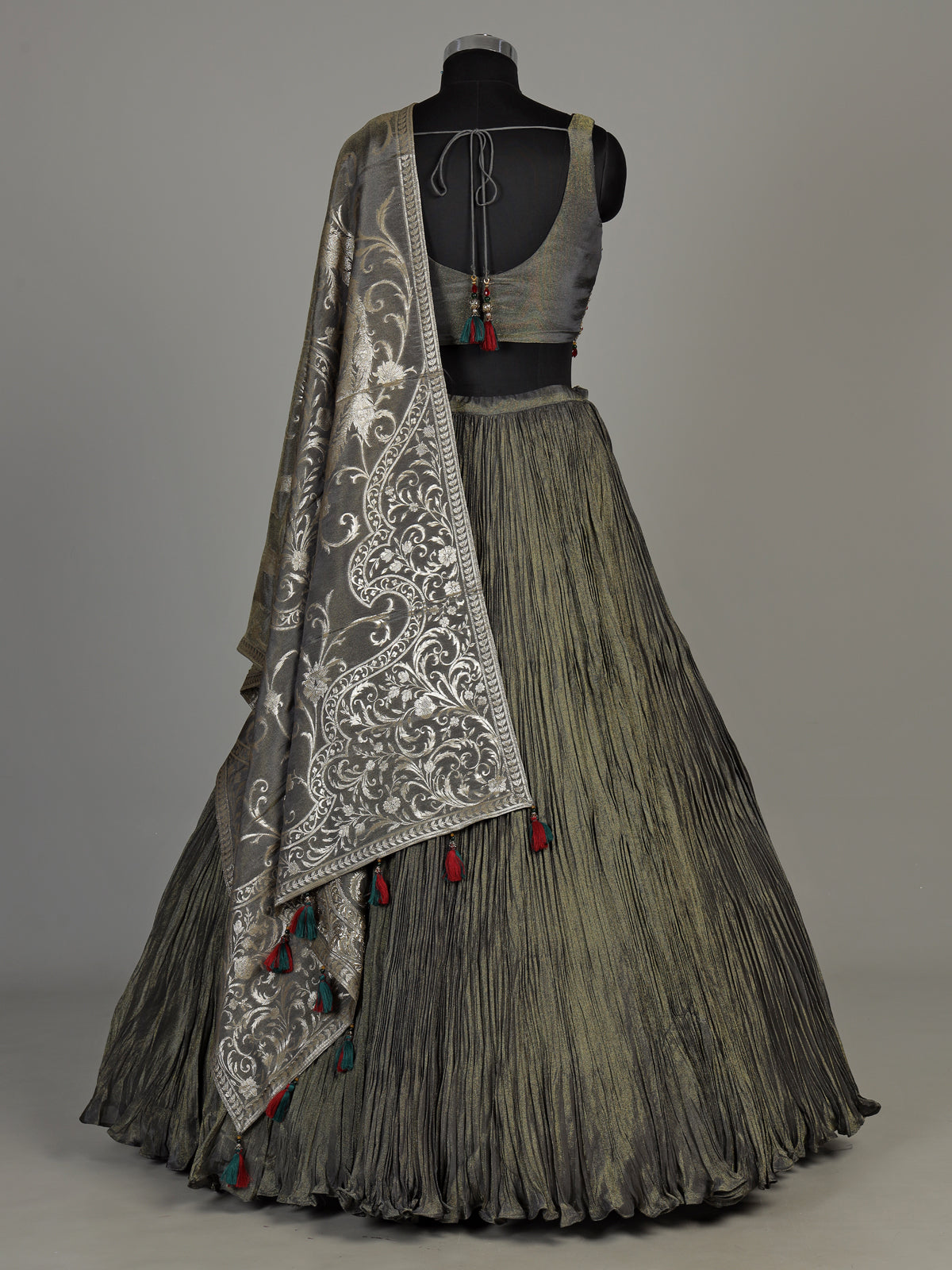 Pastel mehendi green silk lehenga choli with pearl embellishments