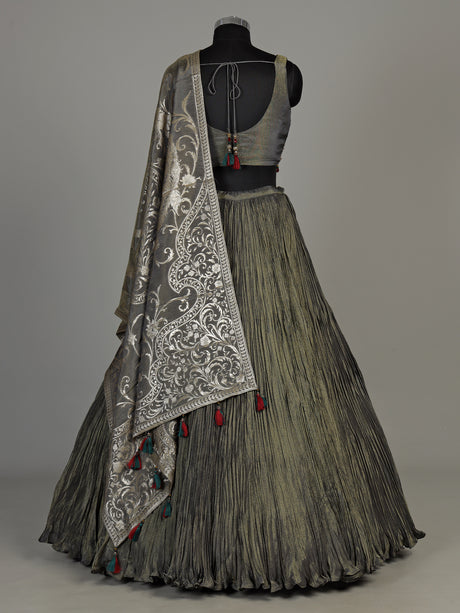 Pastel mehendi green silk lehenga choli with pearl embellishments