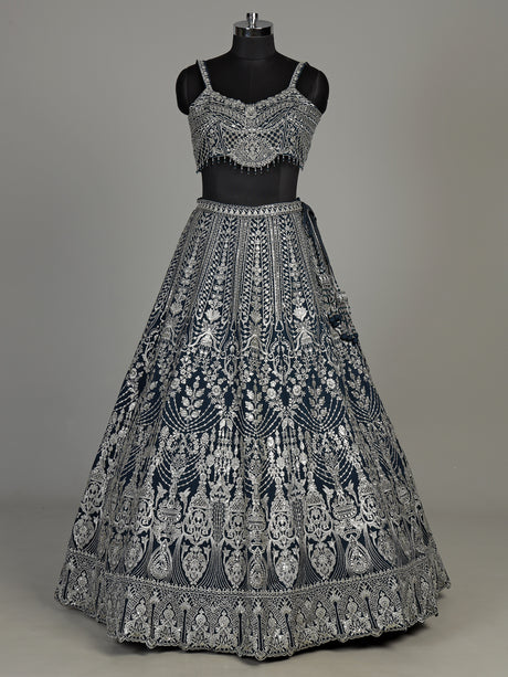 Peacock blue silk lehenga choli with heavy tassel embellishments