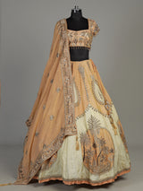 Peach silk lehenga choli with zardosi cap sleeve embellishments