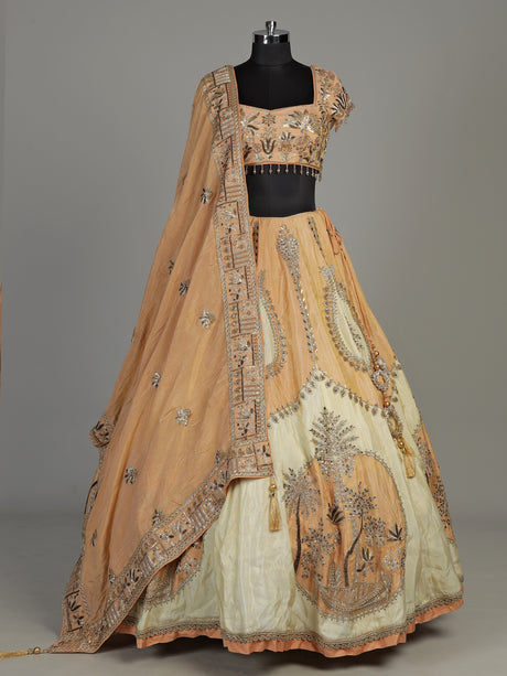 Peach silk lehenga choli with zardosi cap sleeve embellishments